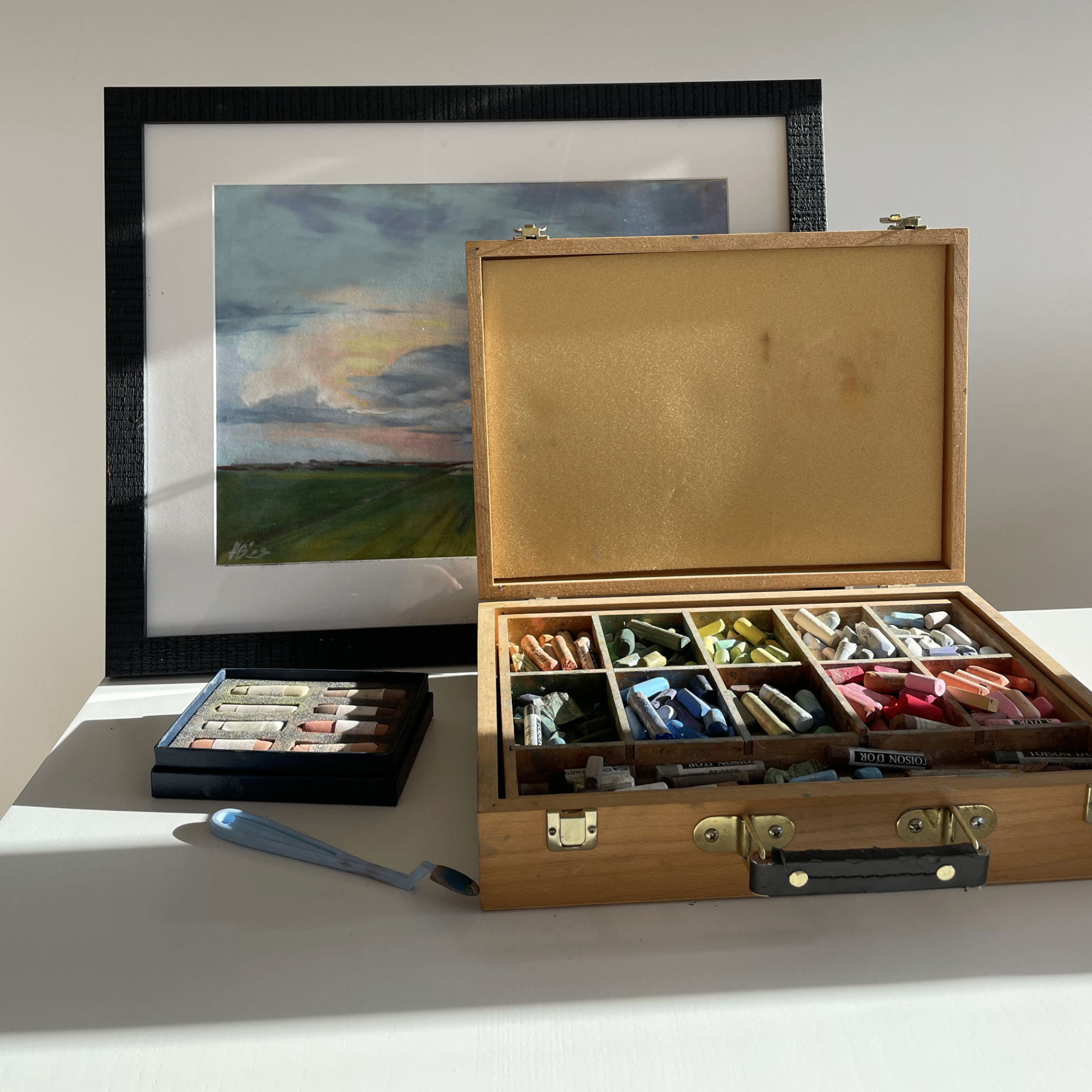 Pastel box and framed landscape painting