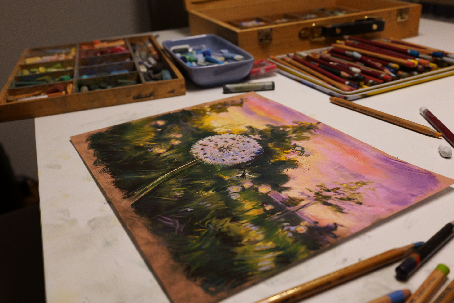 Pastel masterclass table with a floral pastel work in progress